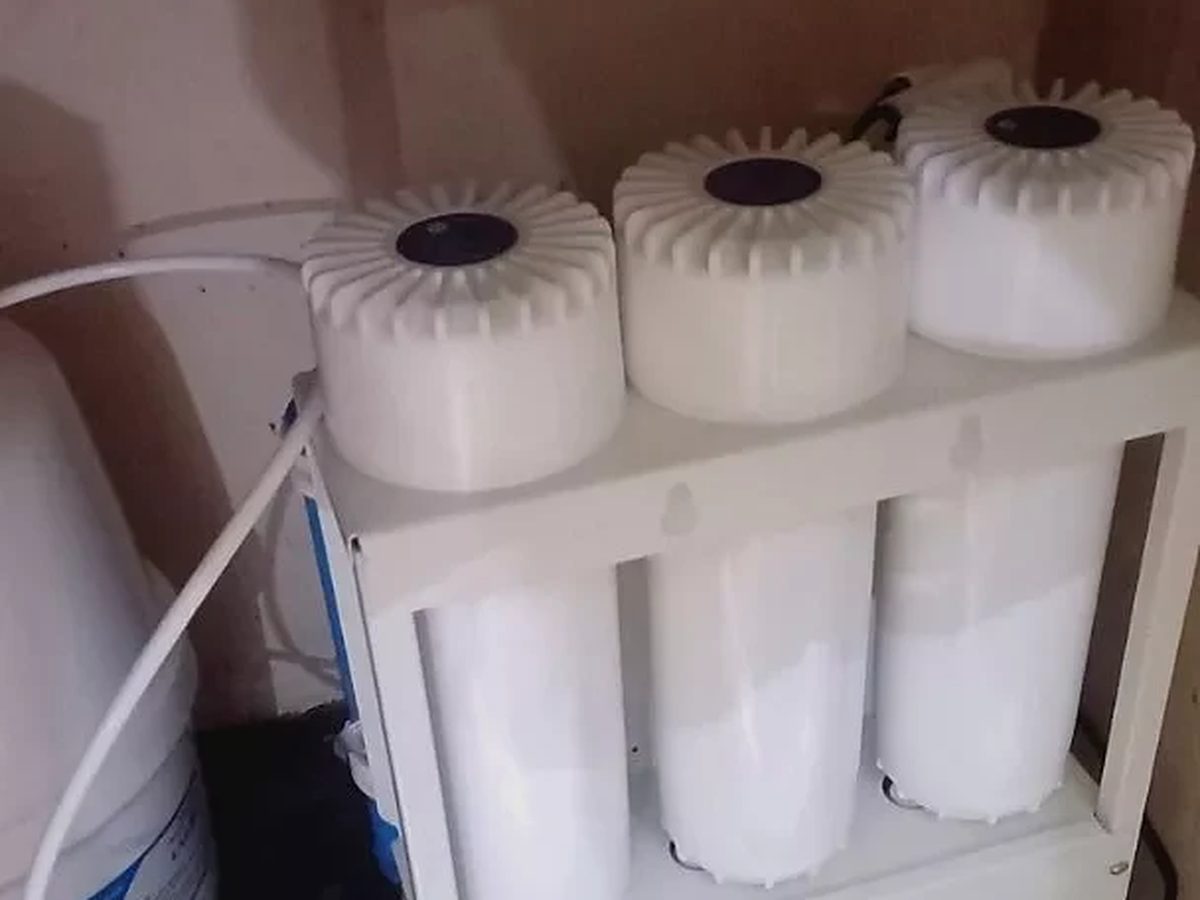 Karofi pre-filter housings installed in a cabinet